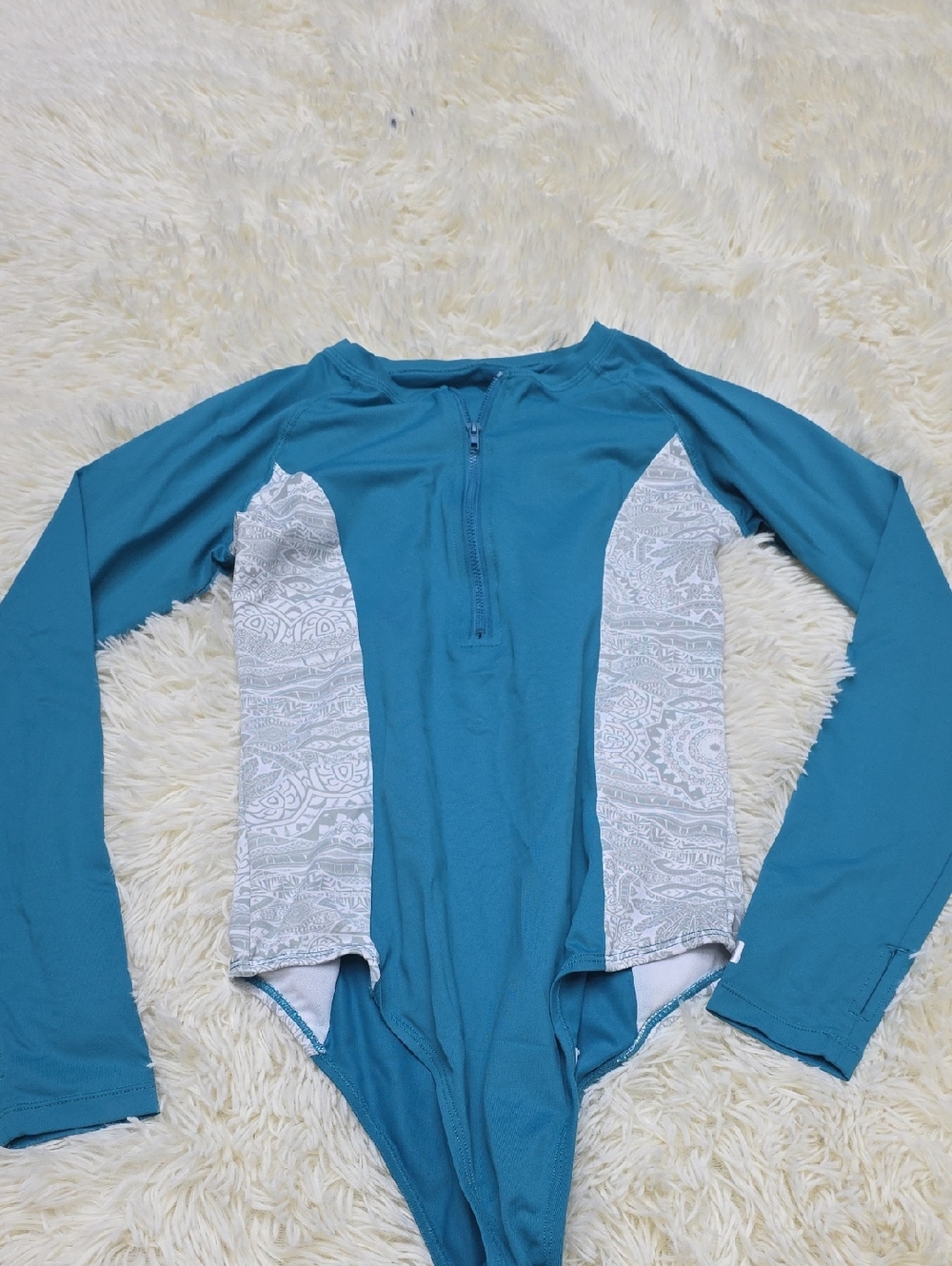 Teal Long Sleeve One-Piece Swimsuit with White Patterned Panels
